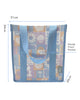 A square canvas tote bag with a pastel patchwork pattern featuring seashells, flowers, and palm trees in lavender, orange, and light blue, with solid light blue handles.  Lizzie Print - Daily Bag - Reusable bags online | Weekender bags | Shopper bags | Pouches  Hello Weekend Beige canvas handles | Beach Bags