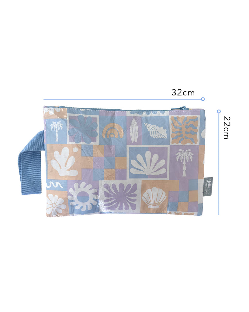 A handy rectangle shaped zippered pouch in a blue, purple and orange print. Lizzie print - Good To Go Pouch - Reusable bags online | Daily bags | Shopper bags | Weekender bags | Hello Weekend Pouch