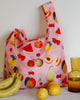 Reusable shopping bag with fruit pattern on a pink background. Fruit Print - Shopper Bag - Reusable bags online | Daily bags | Shopper bags | Weekender bags  Hello Weekend