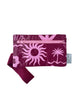 A small zippered pouch with a maroon wrist strap, featuring a palm tree and sun mixed pattern of bright pink shapes on a maroon colour. A small fabric tag on the right reads Hello Weekend. Layla Print - Phone Pouch - Reusable bags online | Daily bags | Shopper bags | Weekender bags  Hello Weekend