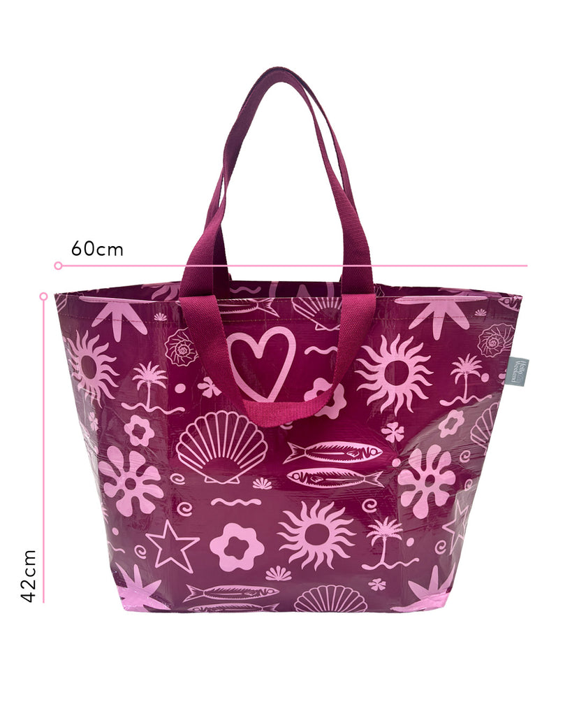 A Hello Weekend magenta tote bag with a pink and white ocean-themed pattern featuring seashells, starfish, waves, and a heart with two sets of maroon cotton canvas straps. Layla Print - Weekender Bag - Reusable bags online | Daily bags | Shopper bags | Pouches  Hello Weekend Beige canvas handles | Beach Bags