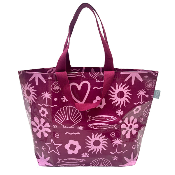 A Hello Weekend magenta tote bag with a pink and white ocean-themed pattern featuring seashells, starfish, waves, and a heart with two sets of maroon cotton canvas straps. Layla Print - Weekender Bag - Reusable bags online | Daily bags | Shopper bags | Pouches  Hello Weekend Beige canvas handles | Beach Bags
