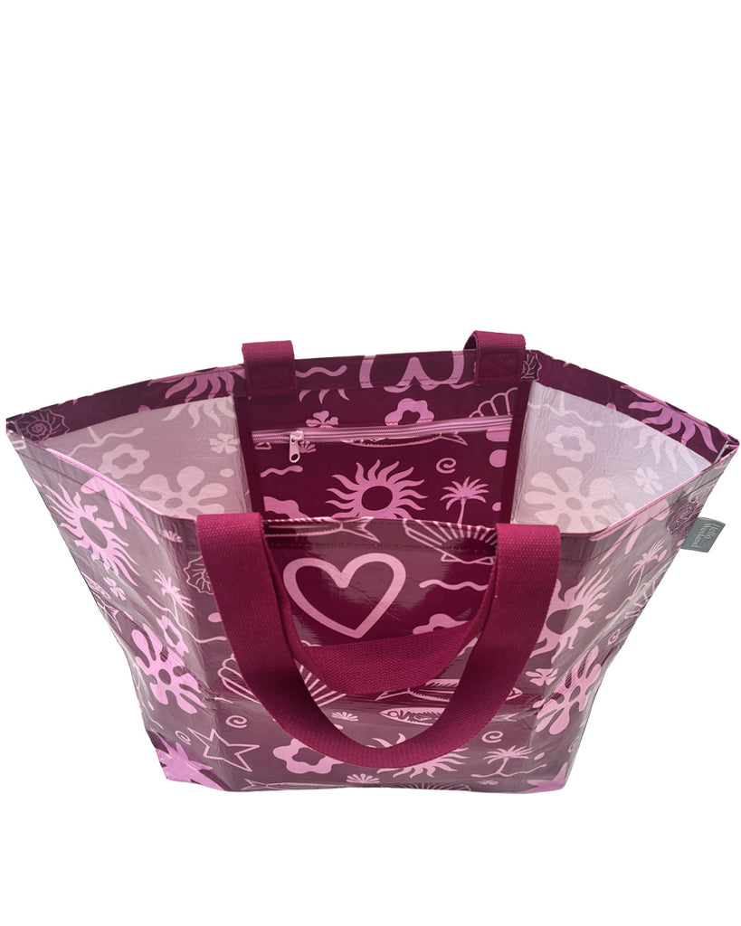 A Hello Weekend magenta tote bag with a pink and white ocean-themed pattern featuring seashells, starfish, waves, and a heart with two sets of maroon cotton canvas straps. Layla Print - Weekender Bag - Reusable bags online | Daily bags | Shopper bags | Pouches  Hello Weekend Beige canvas handles | Beach Bags