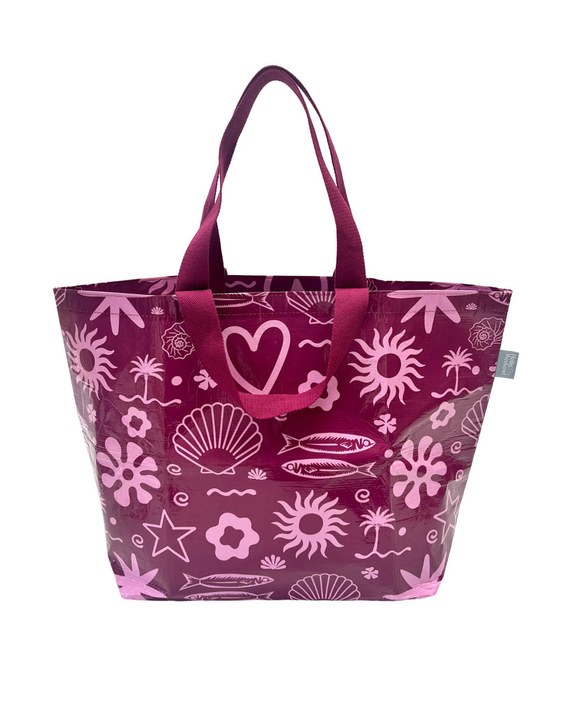 A Hello Weekend magenta tote bag with a pink and white ocean-themed pattern featuring seashells, starfish, waves, and a heart with two sets of maroon cotton canvas straps. Layla Print - Weekender Bag - Reusable bags online | Daily bags | Shopper bags | Pouches  Hello Weekend Beige canvas handles | Beach Bags